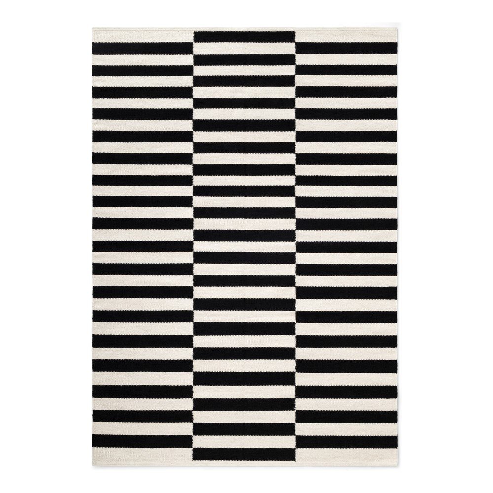 Fekete-fehér kétoldalas kézi szövésű gyapjú szőnyeg 120x180 cm Donna – Hanse Home